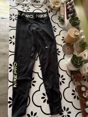 Nike Black Compression Leggings with Neon Yellow Accents